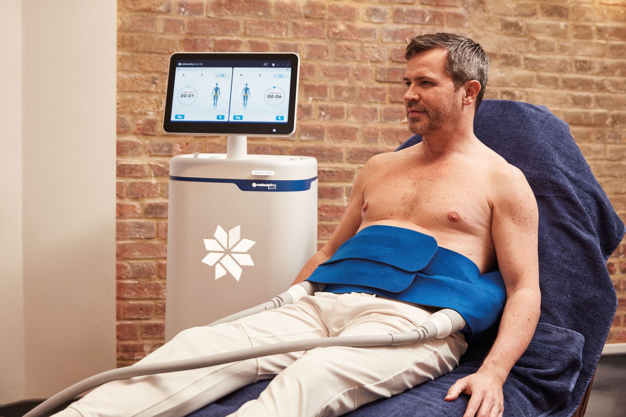 man receiving the Coolsculpting treatment
